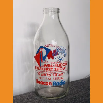 Beacon Radio Will Tudor Breakfast Show milk bottle, late 80s