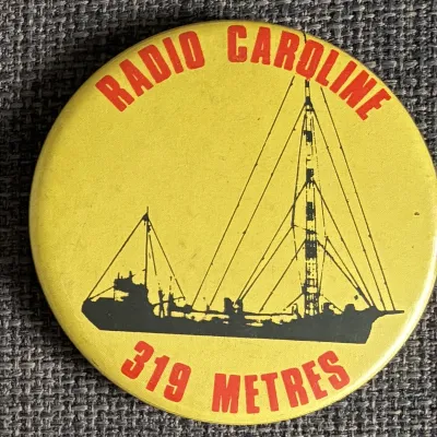 Radio Caroline 319 metres badge, 1980s